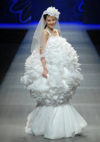 30 Funny Wedding Dresses That Should Have Never Come Down The Aisle
